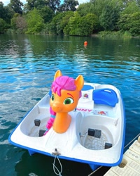 Size: 1080x1350 | Tagged: safe, sunny starscout, earth pony, pony, g5, my little pony: a new generation, boat, bust, female, irl, lake, london, lottie.london, mare, my little pony: a new generation logo, photo, tree