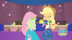 Size: 3410x1920 | Tagged: safe, screencap, applejack, fluttershy, best in show: the pre-show, equestria girls, g4, my little pony equestria girls: better together, applejack's hat, belt, best in show logo, clothes, cowboy hat, cutie mark, cutie mark on clothes, denim skirt, eyes closed, female, geode of super strength, hat, jewelry, magical geodes, microphone, necklace, skirt, smiling