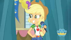 Size: 3410x1920 | Tagged: safe, screencap, applejack, best in show: the pre-show, equestria girls, equestria girls series, g4, spoiler:eqg series (season 2), applejack's hat, applejack's shirt with a collar, belt, best in show logo, clothes, collar, collar shirt, cowboy hat, cutie mark, cutie mark on clothes, denim skirt, female, freckles, geode of super strength, grin, hair, hand on hip, hat, jewelry, magical geodes, microphone, necklace, ponytail, shirt, shirt with a collar, skirt, smiling, solo, t-shirt, teenager