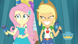 Size: 3410x1920 | Tagged: safe, screencap, applejack, fluttershy, best in show: the pre-show, equestria girls, equestria girls series, g4, spoiler:eqg series (season 2), applejack's hat, applejack's shirt with a collar, belt, best in show logo, clothes, collar, collar shirt, cowboy hat, cutie mark, cutie mark on clothes, denim skirt, dress, female, freckles, geode of fauna, geode of super strength, grin, hair, hairpin, hat, implied lesbian, jewelry, lidded eyes, magical geodes, microphone, necklace, ponytail, shirt, shirt with a collar, skirt, smiling, smirk, t-shirt, teenager