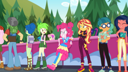 Size: 1397x786 | Tagged: safe, screencap, cherry crash, desert sage, dj pon-3, doodle bug, fluttershy, garden grove, laurel jade, pinkie pie, raspberry lilac, sandalwood, sci-twi, sunset shimmer, twilight sparkle, vinyl scratch, equestria girls, equestria girls series, g4, sunset's backstage pass!, spoiler:eqg series (season 2), ass, background human, backpack, bare shoulders, butt, clothes, crossed arms, feet, geode of sugar bombs, geode of telekinesis, glasses, laurel booty, magical geodes, pants, pantyhose, rear view, sandals, sleeveless, smiling, strapless