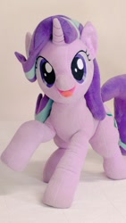 Size: 576x1024 | Tagged: safe, artist:nekokevin, starlight glimmer, pony, unicorn, series:nekokevin's glimmy, g4, female, irl, looking at you, mare, open mouth, photo, plushie, raised hoof, smiling, solo, starlight glimmer plushie