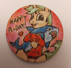 Size: 2772x2640 | Tagged: safe, artist:megabait, oc, oc:markov, pony, shark, unicorn, blåhaj, clothes, craft, green hair, handmade, happy birthday, heart, high res, hoodie, hug, looking at you, magnet, open mouth, open smile, plushie, pyrography, red hoodie, shark plushie, smiling, traditional art, wood, wooden magnet, wooden token