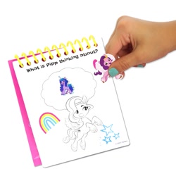 Size: 2000x2000 | Tagged: safe, izzy moonbow, pipp petals, human, pegasus, pony, unicorn, g5, official, coloring page, disembodied hand, female, hand, high res, irl, irl human, mare, merchandise, notepad, photo, simple background, sticker, text, white background
