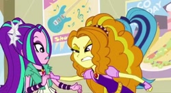 Size: 1259x687 | Tagged: safe, screencap, adagio dazzle, aria blaze, sonata dusk, equestria girls, g4, my little pony equestria girls: rainbow rocks, angry, disguise, disguised siren, female, food, gem, guitar, musical instrument, poster, siren gem, taco, taco tuesday