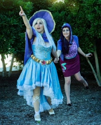 Size: 1080x1341 | Tagged: safe, artist:mieucosplay, artist:sarahndipity cosplay, starlight glimmer, trixie, human, g4, cape, clothes, cosplay, costume, hat, irl, irl human, photo, pointing, trixie's cape, trixie's hat