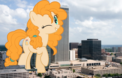 Size: 1726x1112 | Tagged: safe, artist:jhayarr23, artist:thegiantponyfan, pear butter, earth pony, pony, g4, female, freckles, giant pony, giant/macro earth pony, giantess, highrise ponies, irl, macro, mare, mega giant, oklahoma, oklahoma city, one eye closed, photo, ponies in real life, raised hoof, smiling, wink