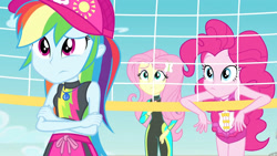 Size: 3410x1920 | Tagged: safe, screencap, fluttershy, pinkie pie, rainbow dash, equestria girls, equestria girls specials, g4, my little pony equestria girls: better together, my little pony equestria girls: forgotten friendship, cap, clothes, crossed arms, female, fluttershy's wetsuit, geode of fauna, geode of sugar bombs, geode of super speed, hairpin, hat, high res, jewelry, magical geodes, midriff, necklace, one-piece swimsuit, pinkie pie swimsuit, sleeveless, swimming trunks, swimsuit, trio, trio female, volleyball net, wetsuit