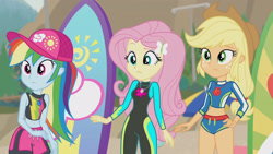 Size: 3410x1920 | Tagged: safe, screencap, applejack, fluttershy, rainbow dash, blue crushed, equestria girls, equestria girls series, g4, applejack's hat, beach, belly button, cap, clothes, cowboy hat, female, fluttershy's wetsuit, geode of fauna, geode of super speed, geode of super strength, hairpin, hat, high res, jewelry, magical geodes, necklace, sleeveless, smiling, surfboard, swimming trunks, swimsuit, wetsuit