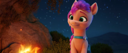 Size: 1366x570 | Tagged: safe, screencap, sunny starscout, earth pony, pony, g5, my little pony: a new generation, spoiler:my little pony: a new generation, 3d, campfire, female, night, png, solo