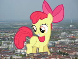 Size: 2000x1500 | Tagged: safe, artist:lilcinnamon, artist:thegiantponyfan, apple bloom, earth pony, pony, g4, apple bloom's bow, blank flank, bow, female, filly, germany, giant pony, giant/macro earth pony, giantess, hair bow, highrise ponies, irl, macro, mega apple bloom, mega giant, munich, photo, ponies in real life