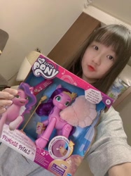 Size: 1108x1478 | Tagged: safe, pipp petals, human, g5, my little pony: a new generation, spoiler:my little pony: a new generation, irl, irl human, photo, toy