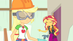 Size: 3410x1920 | Tagged: safe, screencap, applejack, sunset shimmer, constructive criticism, equestria girls, g4, my little pony equestria girls: better together, belt, clothes, cutie mark, cutie mark on clothes, denim skirt, eyes closed, female, geode of empathy, geode of super strength, goggles, hammer, helmet, jacket, leather, leather jacket, magical geodes, skirt, smiling