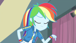 Size: 3410x1920 | Tagged: safe, screencap, rainbow dash, constructive criticism, equestria girls, equestria girls series, g4, clothes, constructive criticism: rainbow dash, cutie mark, cutie mark on clothes, eyes closed, female, geode of super speed, hand on hip, high res, hoodie, jewelry, magical geodes, necklace, smiling, solo