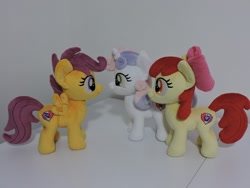 Size: 800x600 | Tagged: safe, artist:little-broy-peep, apple bloom, scootaloo, sweetie belle, earth pony, pegasus, pony, unicorn, g4, bow, cutie mark crusaders, female, filly, hair bow, irl, photo, plushie, trio
