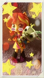 Size: 540x960 | Tagged: safe, discord, sunset shimmer, equestria girls, g4, black sclera, boots, chibi, clothes, doll, dress, equestria girls minis, eqventures of the minis, irl, jacket, leather jacket, shoes, stars, swirls, toy