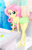 Size: 861x1329 | Tagged: safe, artist:charliexe, fluttershy, equestria girls, adorasexy, bare shoulders, barefoot, bath, bathroom, bathtub, breasts, cleavage, cute, feet, female, happy, looking at you, rubber duck, sexy, shyabetes, smiling, smiling at you, solo, towel