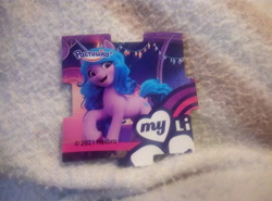 Size: 4192x3104 | Tagged: safe, izzy moonbow, pony, unicorn, g5, my little pony: a new generation, cute, cyrillic, danonino, izzybetes, jigsaw, looking at you, magnet, merchandise, photo, rastishka, russian