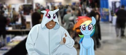 Size: 4096x1809 | Tagged: safe, artist:_ton618_, rainbow dash, human, pegasus, pony, g4, blurry background, clothes, cosplay, costume, dark skin, duo focus, eyebrows, eyebrows visible through hair, female, hoodie, human and pony, human male, looking at you, male, mare, real life background, smiling, thumbs up