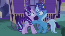 Size: 640x360 | Tagged: safe, screencap, starlight glimmer, trixie, pony, unicorn, g4, to where and back again, female, hat, mare, night, nightcap, nose to nose, trixie's nightcap, trixie's wagon, wagon