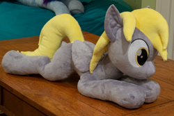 Size: 1280x854 | Tagged: safe, artist:azgchip, derpy hooves, pegasus, pony, g4, female, irl, lying down, mare, missing cutie mark, photo, plushie, solo