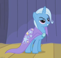 Size: 758x720 | Tagged: safe, screencap, trixie, pony, unicorn, boast busters, g4, season 1, brooch, cape, clothes, cropped, female, grin, hooves, horn, imgflip, jewelry, lidded eyes, mare, shadow, smiling, solo, standing, trixie's brooch, trixie's cape