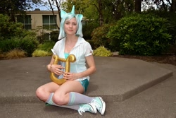 Size: 2448x1632 | Tagged: safe, artist:brawny buck, lyra heartstrings, human, g4, clothes, converse, cosplay, costume, everfree northwest, everfree northwest 2014, irl, irl human, lyre, musical instrument, photo, shoes, sitting, sneakers, solo