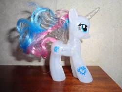 Size: 2592x1944 | Tagged: safe, princess celestia, princess luna, alicorn, pony, g4, brushable, eyeshadow, fusion, horn, irl, irl toy, makeup, photo, solo, spread wings, toy, transparent horn, transparent wings, wings