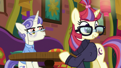 Size: 1920x1080 | Tagged: safe, screencap, first folio, moondancer, pony, unicorn, g4, season 9, the point of no return, clothes, duo, female, glasses, mare, sweater, table, the tasty treat