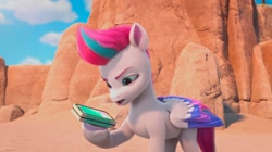 Size: 2388x1339 | Tagged: safe, screencap, zipp storm, pegasus, pony, g5, my little pony: make your mark, my little pony: make your mark chapter 2, portrait of a princess, spoiler:g5, spoiler:my little pony: make your mark chapter 2, spoiler:mymc02e03, beach, cellphone, cliff, female, mare, outdoors, phone, solo