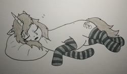 Size: 2048x1199 | Tagged: safe, artist:pony quarantine, oc, oc:fighty, pony, unicorn, clothes, female, grayscale, lying down, mare, monochrome, on side, onomatopoeia, pillow, sleeping, socks, solo, sound effects, striped socks, traditional art, zzz