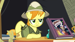 Size: 1920x1080 | Tagged: safe, screencap, daring do, teddie safari, earth pony, pony, g4, season 4, trade ya!, 1080p, clothes, comic book, female, frown, hat, hoof on hip, implied fluttershy, implied rainbow dash, mare, solo, unamused