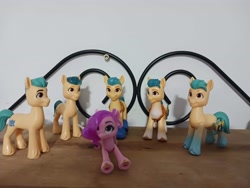 Size: 4080x3060 | Tagged: safe, hitch trailblazer, pipp petals, earth pony, pegasus, pony, g5, my little pony: a new generation, colored hooves, female, hitchfestation, hooves, implied pitch, implied sex, implied shipping, implied straight, irl, male, meme, multeity, photo, piper perri surrounded, ship:pitch, shipping, straight, surrounded, toy