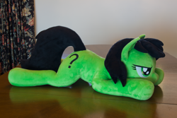 Size: 5184x3456 | Tagged: safe, artist:azgchip, oc, oc:filly anon, earth pony, pony, commission, cute, female, filly, grumpy, irl, lying down, mare, photo, plushie, prone, solo, sploot