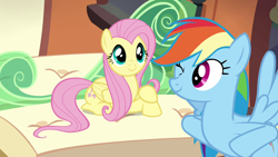 Size: 1280x720 | Tagged: safe, screencap, fluttershy, rainbow dash, pegasus, pony, g4, season 4, trade ya!, cute, dashabetes, duo, female, looking at each other, looking at someone, mare, one eye closed, shyabetes, train, wink