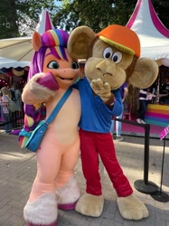 Size: 1124x1500 | Tagged: safe, sunny starscout, earth pony, human, monkey, pony, anthro, g5, official, bag, fursuit, irl, irl human, mascot, mascot costume, netherlands, photo, smiling, tina festival