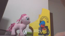 Size: 1280x720 | Tagged: safe, pinkie pie, earth pony, pony, g4, arcade cabinet, arcade game, cute, female, gamer girl, irl, mare, pac-man, photo, plushie, pony plushie, smiling, solo, video game