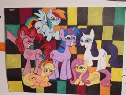 Size: 4160x3120 | Tagged: safe, artist:4agonism, applejack, fluttershy, pinkie pie, rainbow dash, rarity, twilight sparkle, earth pony, pegasus, pony, unicorn, g4, applejack's hat, checkered background, cowboy hat, female, flying, full body, hat, irl, lying down, mane six, photo, raised hoof, unicorn twilight