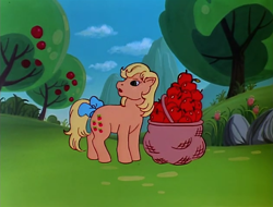 Size: 632x480 | Tagged: safe, screencap, applejack (g1), earth pony, pony, g1, my little pony 'n friends, rescue at midnight castle, apple, apple basket, bow, female, food, mare, solo, tail, tail bow