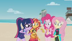 Size: 1920x1080 | Tagged: safe, screencap, fluttershy, pinkie pie, sci-twi, sunset shimmer, twilight sparkle, human, equestria girls, g4, my little pony equestria girls: better together, unsolved selfie mysteries, bare shoulders, beach, belly button, bikini, bikini top, cellphone, clothes, female, fluttershy's wetsuit, geode of empathy, geode of fauna, geode of sugar bombs, geode of telekinesis, glasses, group, hairpin, magical geodes, one-piece swimsuit, phone, pinkie pie swimsuit, ponytail, quartet, sarong, sci-twi swimsuit, sleeveless, smartphone, swimsuit, water, wetsuit