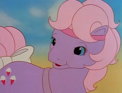 Size: 628x480 | Tagged: safe, screencap, baby lickety-split, earth pony, pony, g1, my little pony: the movie (g1), baby, baby pony, bow, female, filly, foal, headband, solo, tail, tail bow