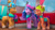 Size: 2388x1325 | Tagged: safe, screencap, hitch trailblazer, izzy moonbow, sparky sparkeroni, sunny starscout, dragon, earth pony, pony, unicorn, g5, my little pony: make your mark, winter wishday, spoiler:g5, bag, bells, clothes, fake antlers, female, floral head wreath, flower, flower in hair, hat, male, mane stripe sunny, mare, pillow, saddle bag, scarf, seat, stallion, toque, tree branch, window, winter hat, wreath