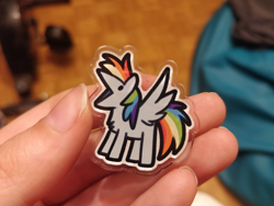 Size: 780x585 | Tagged: safe, artist:julunis14, rainbow dash, human, pegasus, pony, holding a pony, irl, offscreen character, offscreen human, open mouth, photo, pin, spread wings, wings