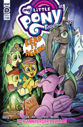 Size: 2063x3131 | Tagged: safe, artist:andy price, idw, official comic, apple bloom, queen chrysalis, scootaloo, sweetie belle, twilight sparkle, alicorn, changeling, changeling queen, earth pony, pegasus, pony, unicorn, g4, official, anniversary, book, candle, cave, comic cover, cutie mark crusaders, facehoof, female, happy, high res, my little pony logo, smiling, speech bubble, twilight sparkle (alicorn)