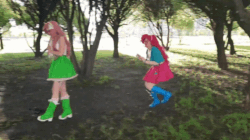 Size: 680x382 | Tagged: safe, fluttershy, pinkie pie, human, equestria girls, g4, animated, ass, boots, butt, clothes, cosplay, costume, flower, forest, gif, glomp, hug, in character, irl, irl human, legs, live action, nature, rose, sexy, shoes, skirt, surprised, upskirt