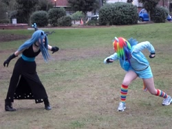 Size: 2140x1606 | Tagged: safe, queen chrysalis, rainbow dash, human, g4, clothes, cosplay, costume, duo, irl, irl human, multicolored hair, photo, rainbow hair, rainbow socks, ready to fight, socks, striped socks
