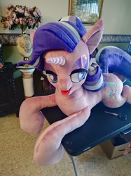 Size: 766x1024 | Tagged: safe, artist:nerofledermaus, starlight glimmer, pony, unicorn, g4, bedroom eyes, heart eyes, horn, irl, lying down, photo, plushie, prone, solo, tongue out, wingding eyes