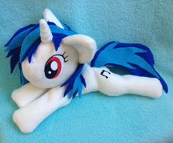 Size: 2008x1654 | Tagged: safe, artist:bewareofkitty, dj pon-3, vinyl scratch, pony, unicorn, g4, beanie (plushie), horn, irl, lying down, photo, plushie, prone, solo