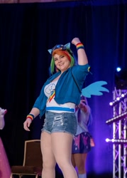 Size: 1080x1511 | Tagged: safe, rainbow dash, human, g4, clothes, cosplay, costume, cutie mark on clothes, goggles, irl, irl human, multicolored hair, photo, ponyville ciderfest, rainbow hair