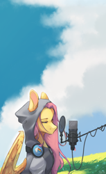 Size: 1280x2093 | Tagged: safe, artist:rladsenpai, fluttershy, pegasus, pony, g4, clothes, cloud, female, grass, grass field, headphones, hoodie, lidded eyes, looking at something, mare, microphone, outdoors, partially open wings, pop filter, rainbow dash's cutie mark, sitting, sky, solo, three quarter view, vertical, wings